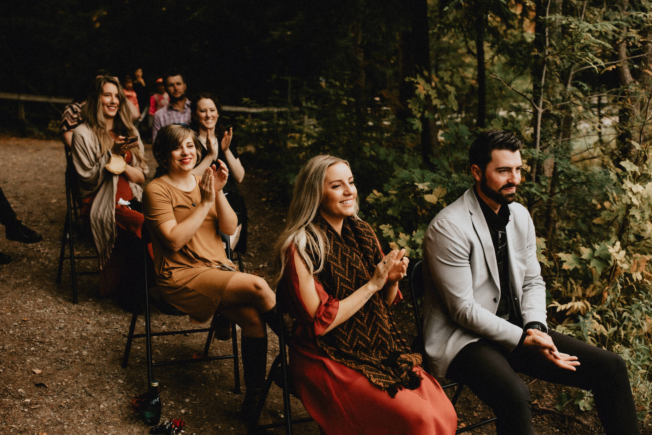 Wedding guests smile and clap - Huron Natural Area Micro Wedding Kitchener, Ontario